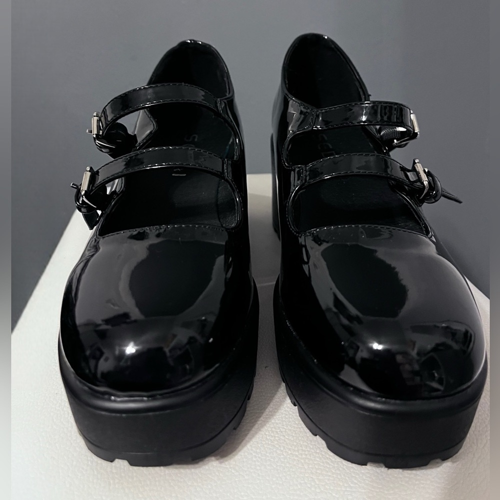 Shiny black platform Mary Jane’s
